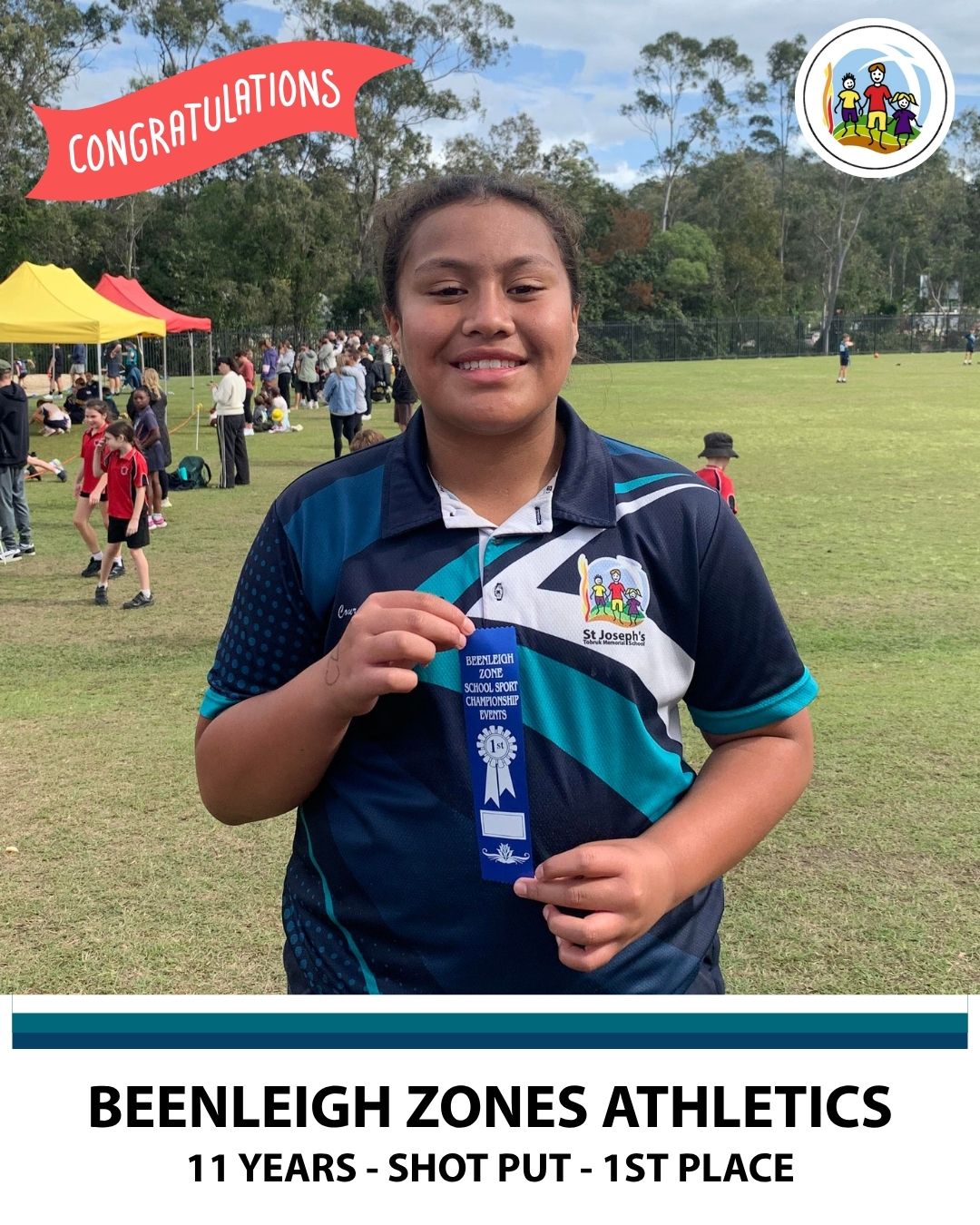 A child holding a 1st place ribbon for Shot Put