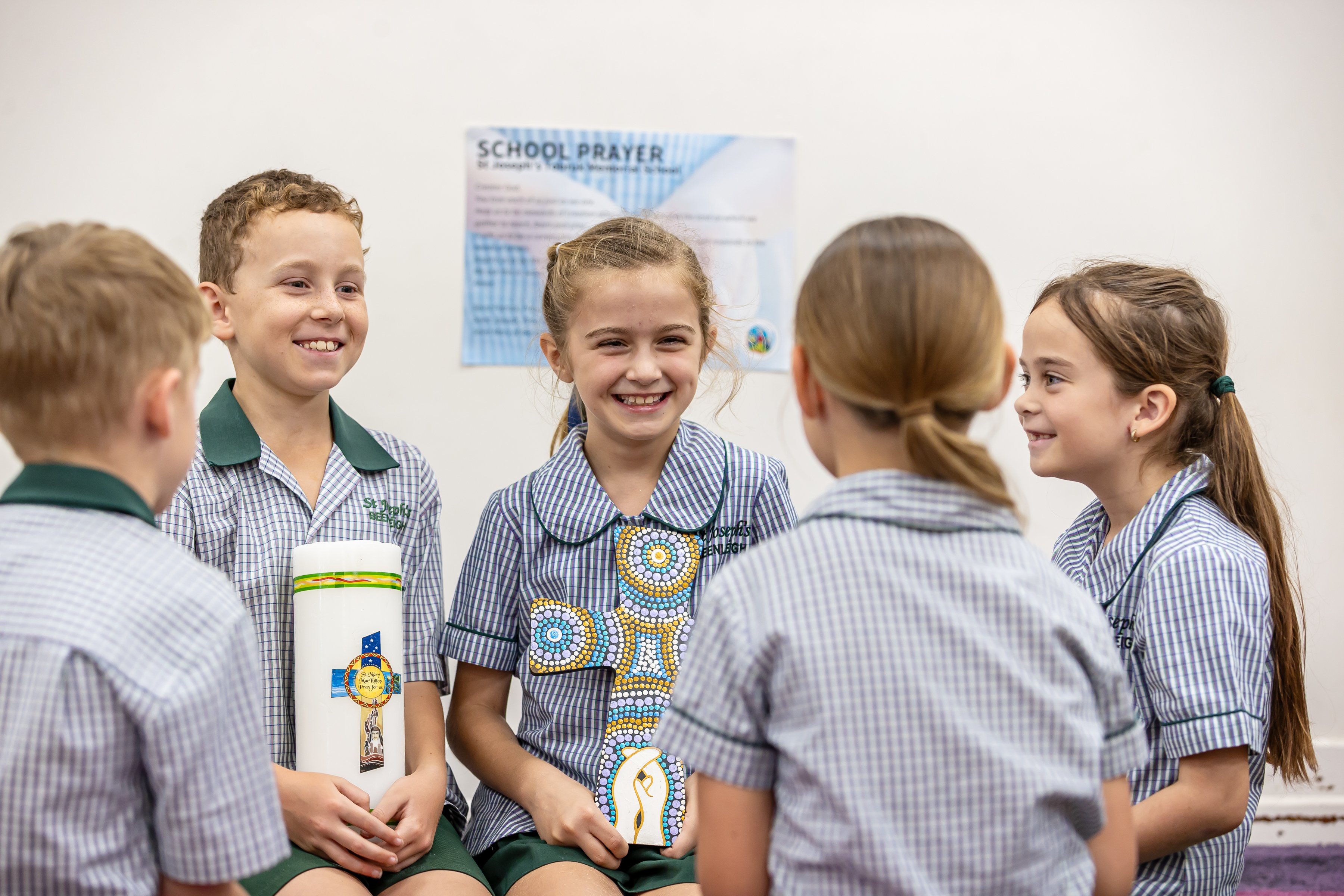 Student's holding religious items